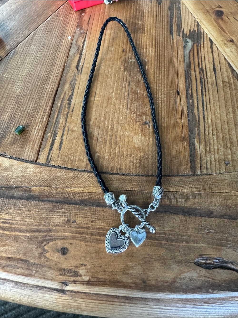 Cord necklace with heart charms